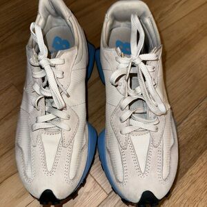 White and blue New Balance 327 trainers
